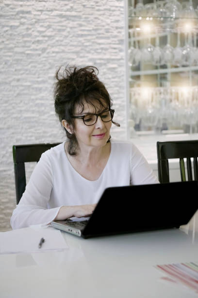 istock Businesswoman working at home 694234604