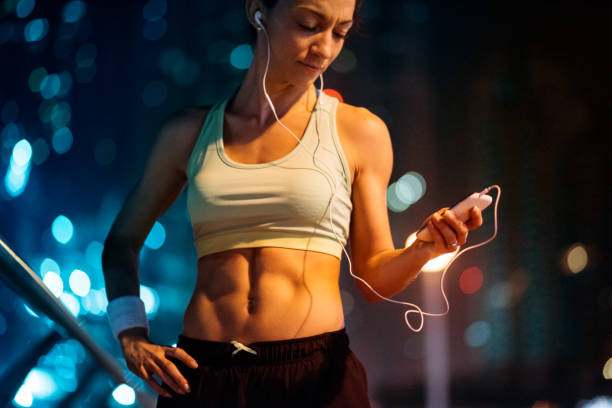 istock Woman listens music 694235012