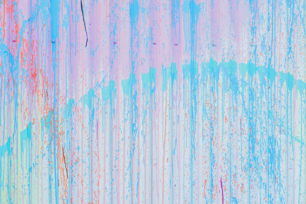 Abstract dirty vintage weathered galvanized corrugated iron metal fence, spattered with paint. For modern background, pattern, wallpaper or banner design Abstract dirty vintage weathered galvanized corrugated iron metal fence, spattered with paint. For modern background, pattern, wallpaper, banner design corrugated metal fence ideas stock pictures, royalty-free photos & images