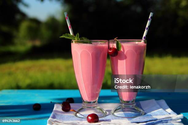 Milkshake With Cherries Stock Photo - Download Image Now - Bar - Drink Establishment, Berry Fruit, Berry Juice