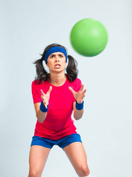 istock Young Hispanic Women Playing Dodgeball 694243750