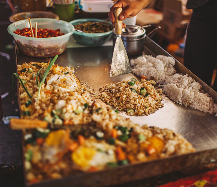 Asian street food - fried rice with vegetables
