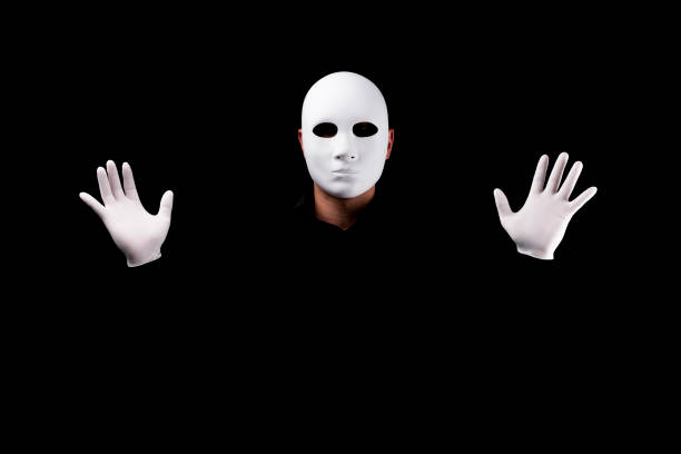 istock Mysterious man with white  mask  and gloves 694244158