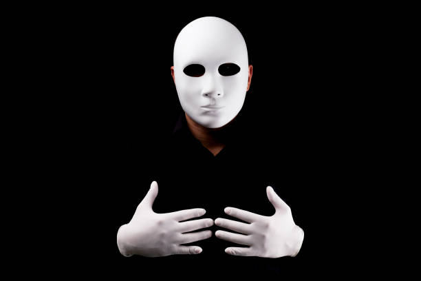 istock Mysterious man with white  mask  and gloves 694244240