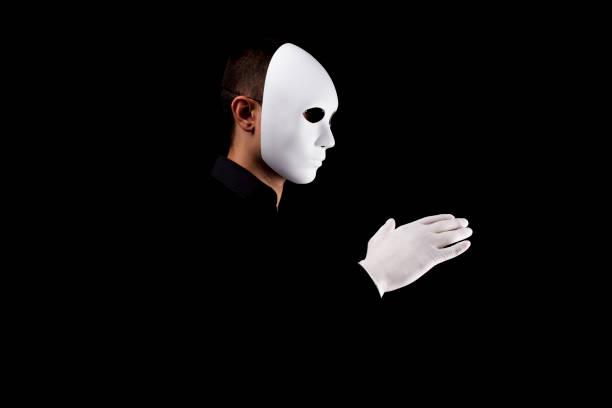 istock Mysterious man with white  mask  and gloves 694244478