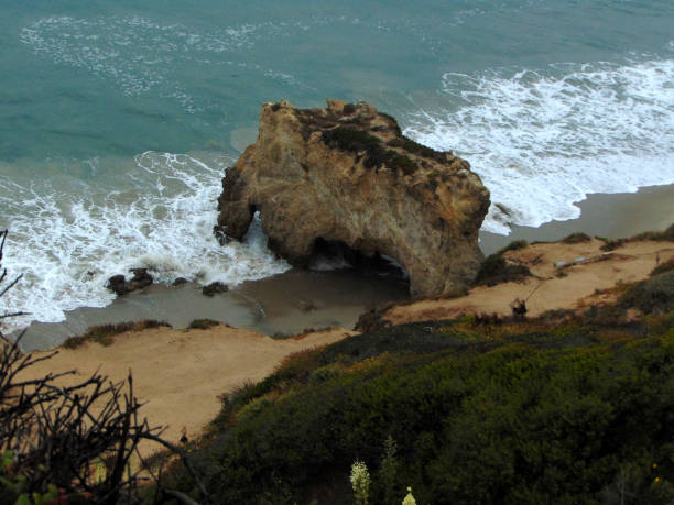 istock Sea Caves As Seen From Atop a Hill 694246942
