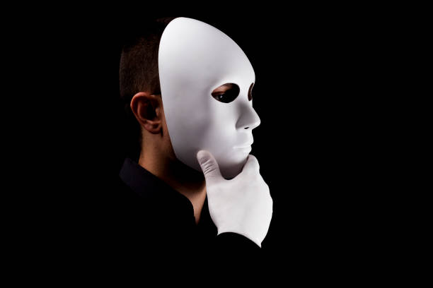 istock Mysterious man with white  mask  and gloves 694246998