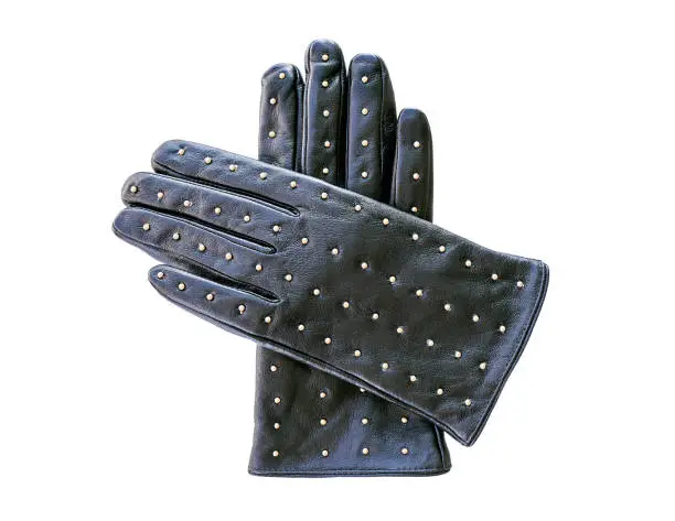 A pair of black leather gloves with decorative metal rivets, isolated on white background.