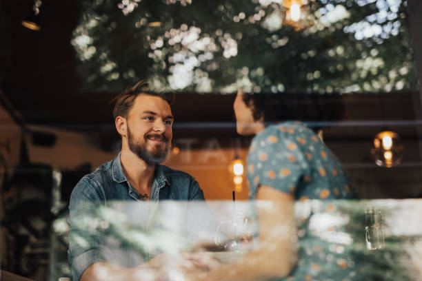 istock Young couple has a date at the coffee shop 694247294