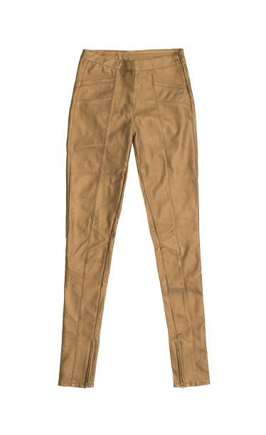 istock gold skinny leather pants, isolated on white background 694253682