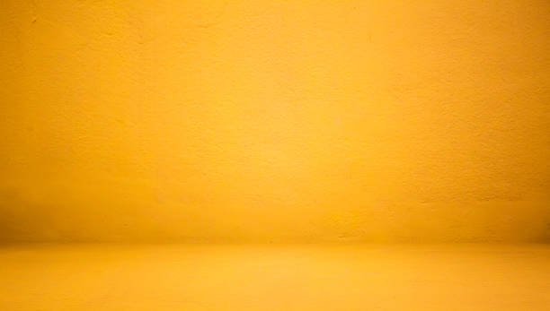 istock Abstract Luxury Clear Yellow wall well use as backdrop,background and layout. 694264992