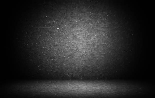 istock Dark grunge textured wall closeup - well use as digital studio background 694265004