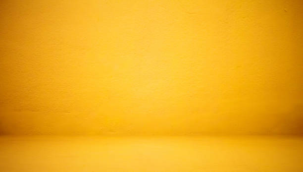 istock Abstract Luxury Clear Yellow wall well use as backdrop,background and layout. 694265012