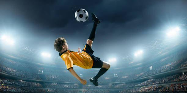 istock Soccer kids player in action in 3D dramatic stadium 694265380