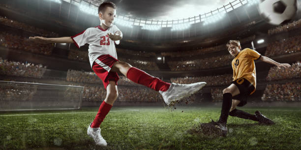 istock Soccer kids players in action in 3D dramatic stadium 694265460
