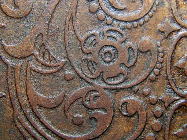 istock The decorative pattern on the old shabby gold 694270256