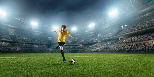 istock Soccer kids player in action in 3D dramatic stadium 694271292