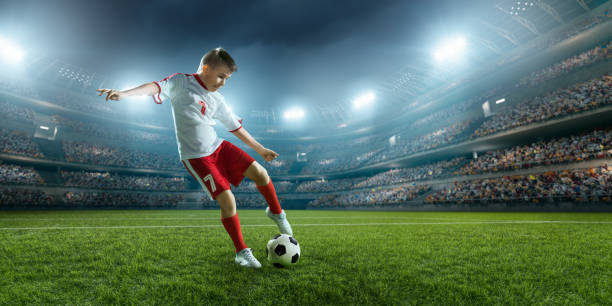 istock Soccer kids player in action in 3D dramatic stadium 694271332
