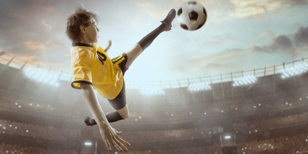 istock Soccer kids player in action in 3D dramatic stadium 694271334