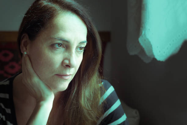 istock Portrait of a woman thinking. 694277240