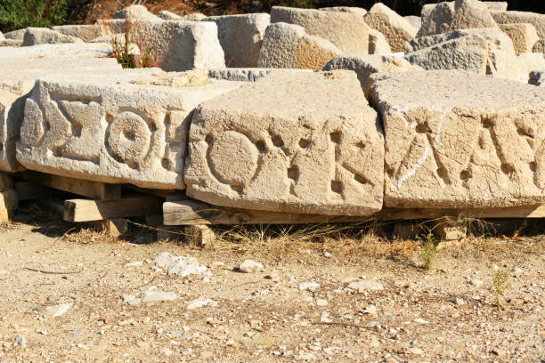 istock Stone with carved script in ancient Lycian city Patara. Turkey 694300334