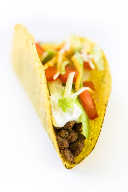 istock Fresh beef tacos in hard yellow corn taco shell 694313546