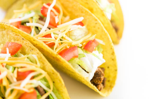 istock Fresh beef tacos in hard yellow corn taco shell 694313572
