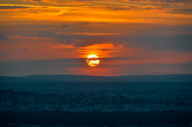 istock Dramatic sunset over Paris, France 694315782