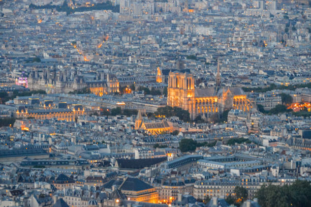 istock Panoramic cityscape of Paris in the evening 694319510