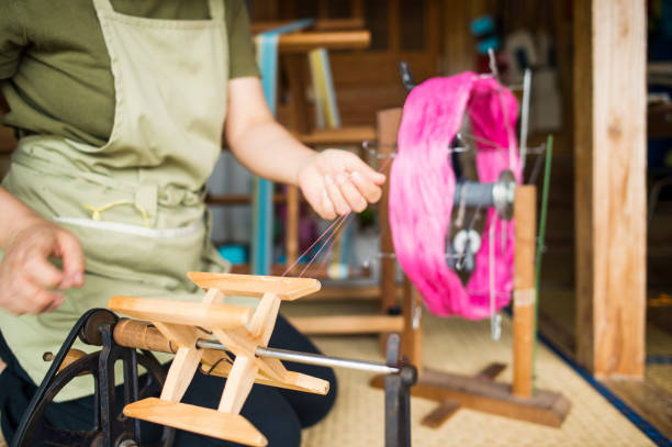 Women working in cloth making studio in okinawa.