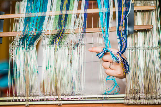 Women working in cloth making studio in okinawa.