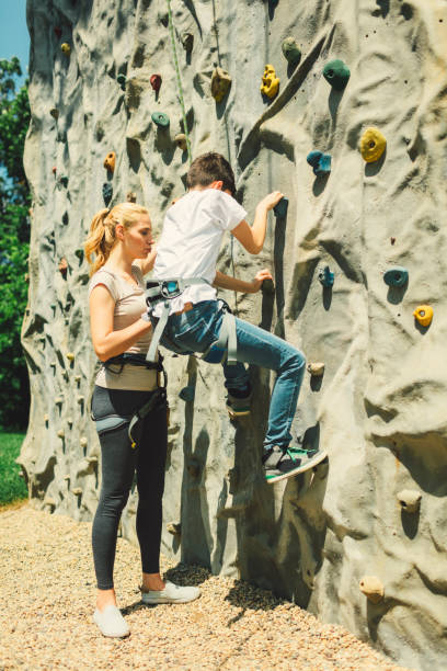 istock Family on free climbing 694326504