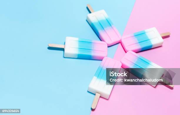 Icecream On Pink And Blue Background Stock Photo - Download Image Now - Flavored Ice, Summer, Ice Cream