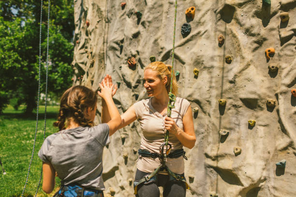 istock Family on free climbing 694330056