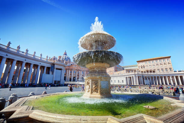 istock Fountain on St. Peter's square in Vatican City. 694340132