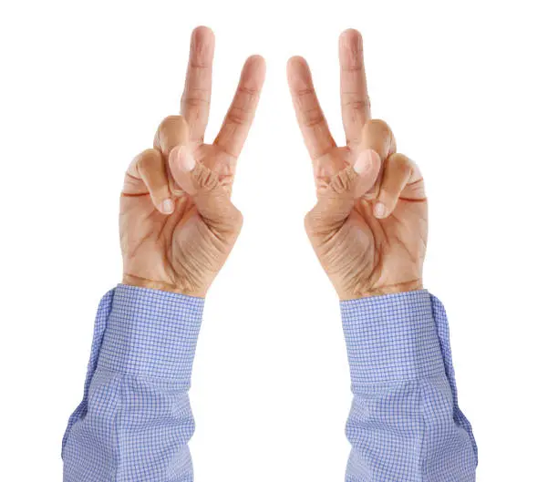 Two fingers up arms raised wearing blue and white plaid shirt isolated on white background