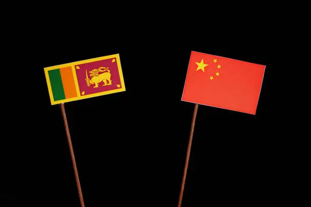 Sri Lanka flag with Chinese flag isolated on black background