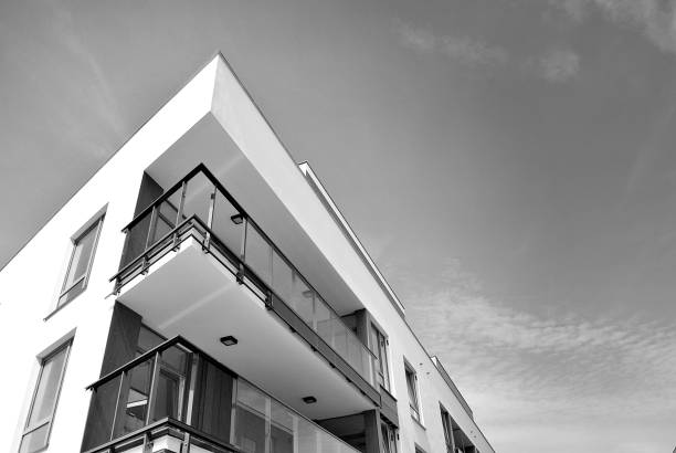 istock Modern apartment building exterior. Black and white 694354804