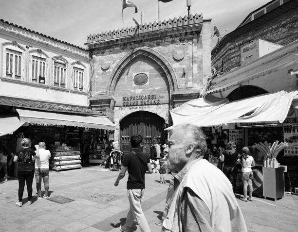 Istanbul,Turkey-June 04,2017: Foreign and turkish tourist walking on the street in old central district of Istanbul near Grand Bazaar entrance