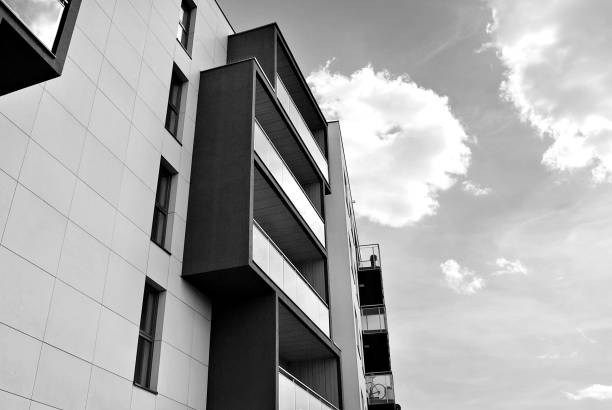 istock Modern apartment building exterior. Black and white 694361262