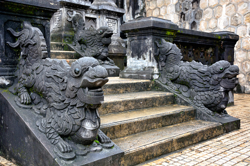 Dragons Statues at tomb of Khai Dinh emperor in Hue, Vietnam