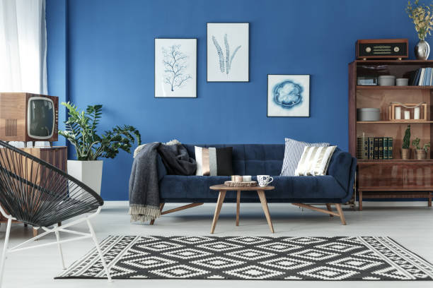 Blue up-to-date lounge Blue up-to-date decor of lounge with blue sofa and patterned carpet upper class photos stock pictures, royalty-free photos & images