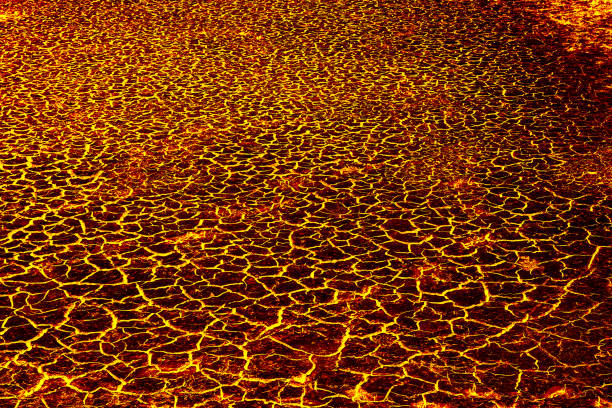 istock heat red cracked ground texture after eruption volcano 694374902