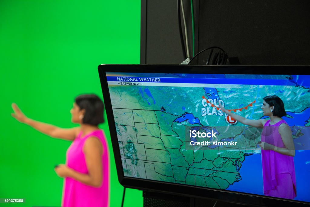 Weather presenter Weather presenter explaining about weather forecast. Weather Stock Photo