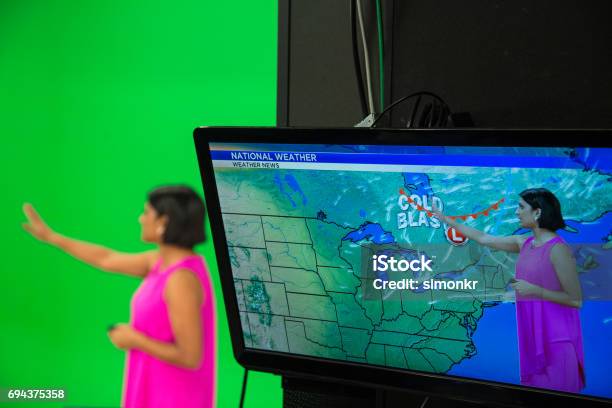 Weather Presenter Stock Photo - Download Image Now - Weather, Meteorology, Forecasting