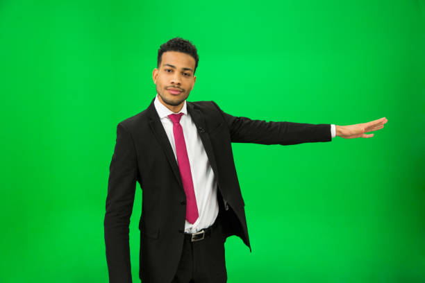 istock Journalist against green background 694375386