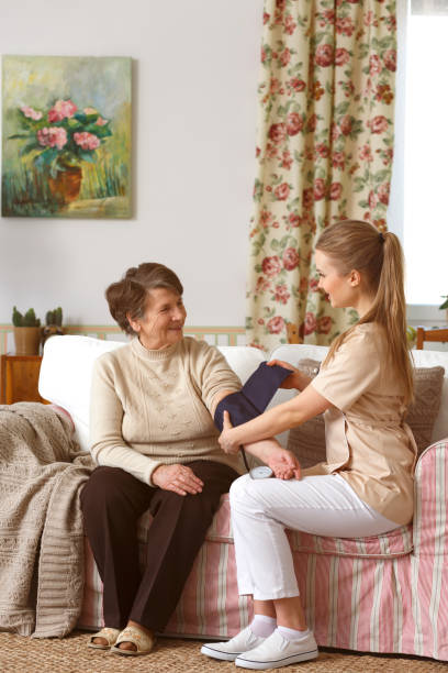 istock Woman having blood pressure measured 694375924