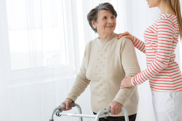 istock Granddaughter helping her grandma 694376036