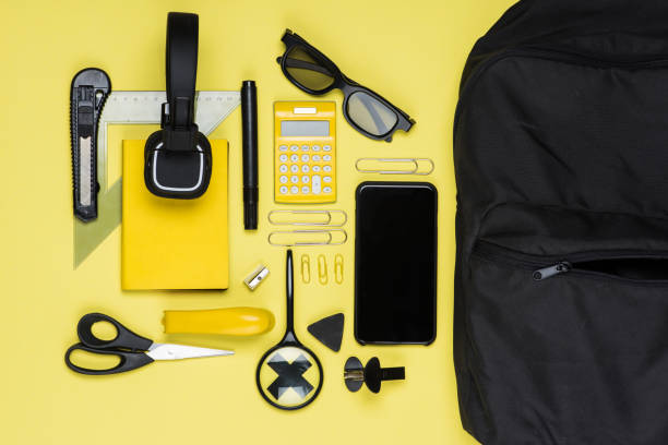 istock flat lay with various school supplies on colorful surface 694378868