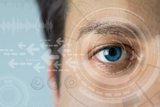 istock young man's eye and technology concept, smart contact lens display, Iris verification, wearable computing, abstract image visual 694389800